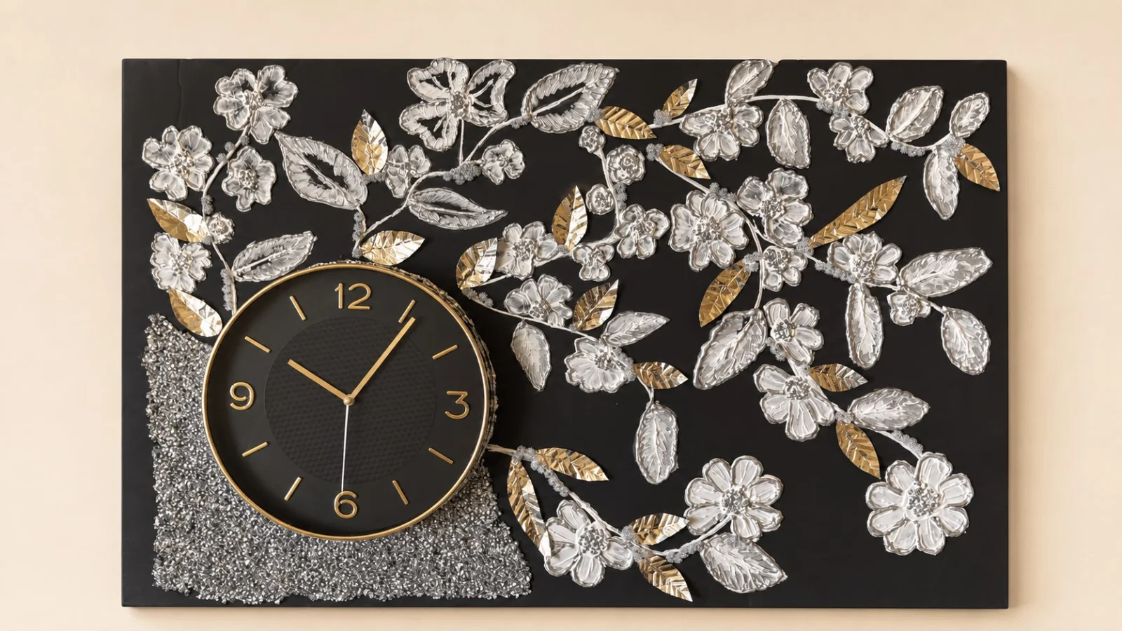 Black rectangular wall panel featuring a round black and gold clock, silver floral branches, golden leaves, and a sparkling silver accent.